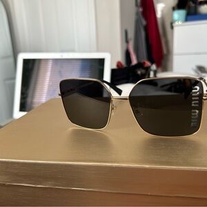 Miu Miu Gold and Black Eyewear